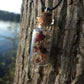 Rodent Bone And Flower Bottle Charm Necklace