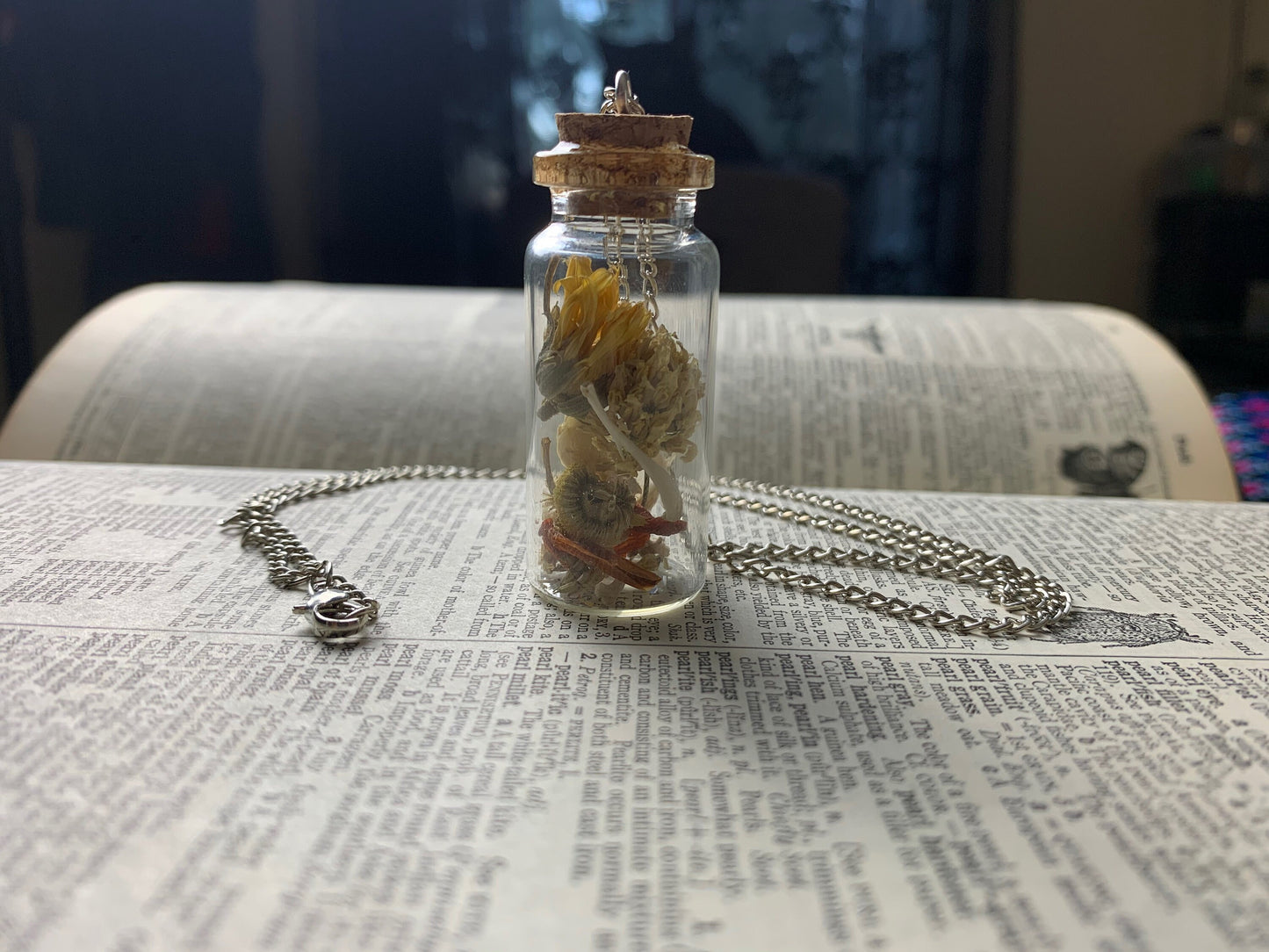 Rodent Bone And Flower Bottle Charm Necklace