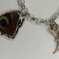 Oddity Charm Bracelet with Rodent Mandible, Butterfly Wings, Python Vertebra, and Seashell