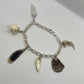 Oddity Charm Bracelet with Rodent Mandible, Butterfly Wings, Python Vertebra, and Seashell