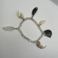 Oddity Charm Bracelet with Rodent Mandible, Butterfly Wings, Python Vertebra, and Seashell